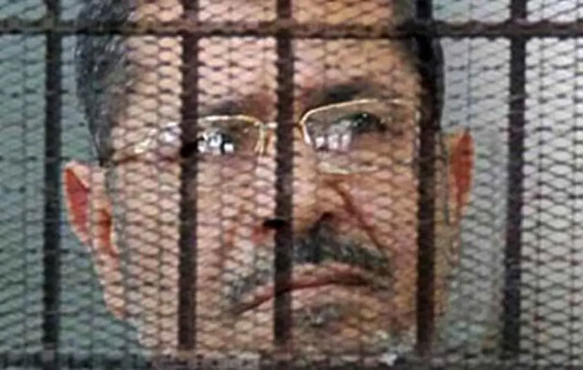 محامي مرسي: آخر كلماته لن أبوح بأسرار بلدي حتى مماتي