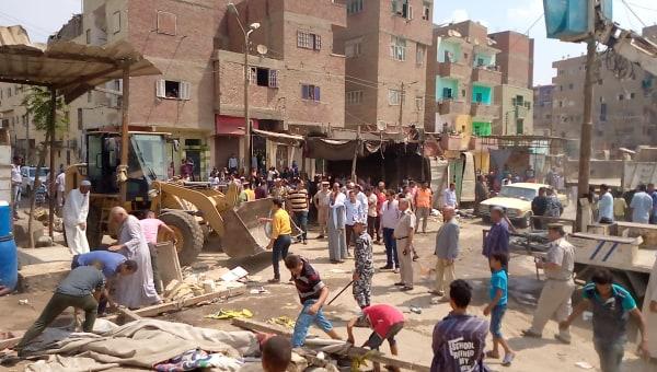 إزالة 1420 حالة تعدى على الطريق بمركز مغاغة بالمنيا
