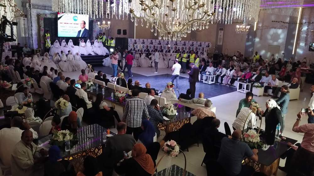 احتفالا بذكري 30 يونيو مستقبل وطن المنيا ينظم حفل زفاف جماعى ل100 عروسه وعريس واحتفالية بميدان بالاس