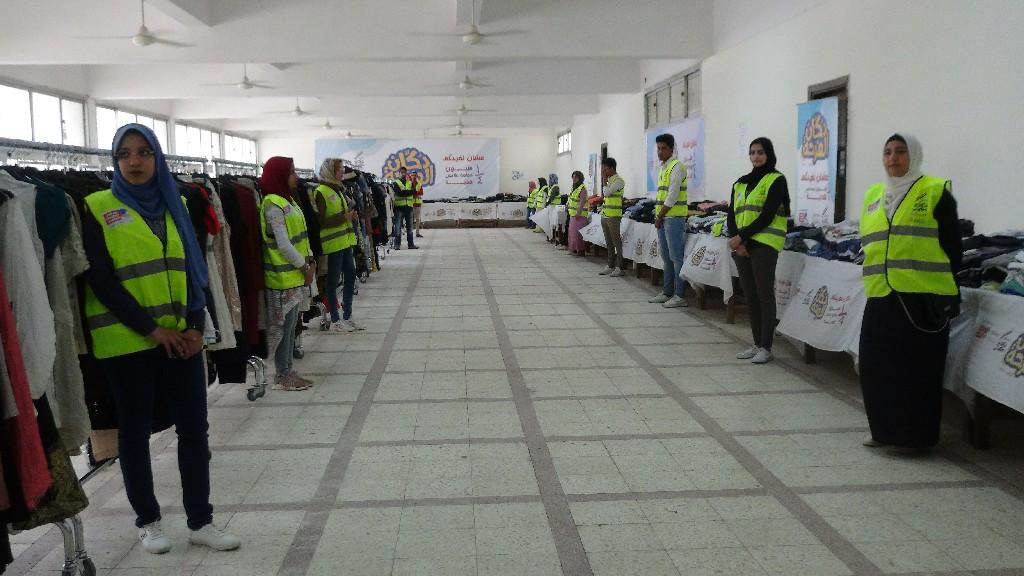  12 ألف قطعة ملابس بالمجان بمعرض الملابس السنوي لجامعة المنيا