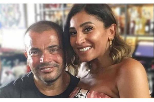 دينا الشربيني تظهر في حفل يحييه عمرو دياب وترقص على أغانيه 
