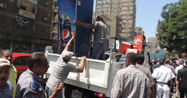 إزالة إشغالات وتعديات لمحلات وكافيهات فى حملة لشرطة المرافق بالجيزة